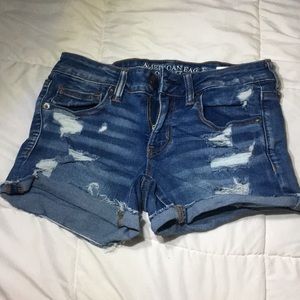 RIPPED LOW WAIST DARK DENIM SHORTS